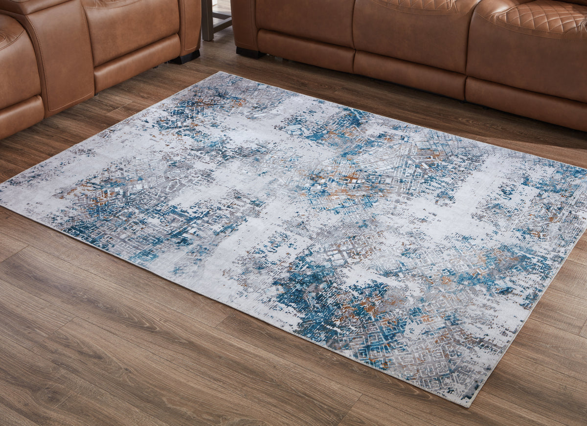 3 Brothers Decor - Ashley Furniture - Garyard Rug - 5' x 7' Washable Rug / Multi - R405772