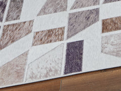 3 Brothers Decor - Ashley Furniture - Jettner Rug - 7'10" x 10' Rug / Multi - R405781