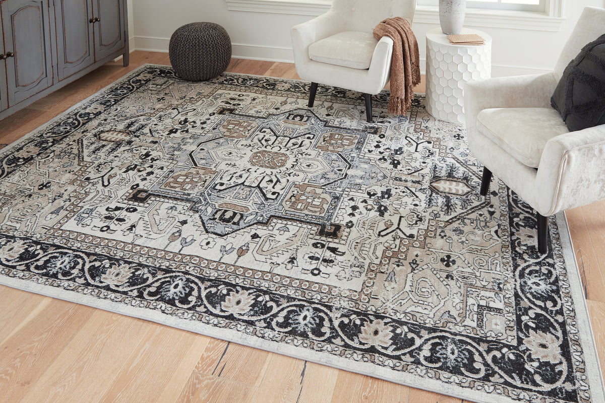 3 Brothers Decor - Ashley Furniture - Gregmoore Rug - 7'9" x 9'11" Washable Rug / Multi - R405821