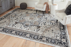 3 Brothers Decor - Ashley Furniture - Gregmoore Rug - 7'9" x 9'11" Washable Rug / Multi - R405821