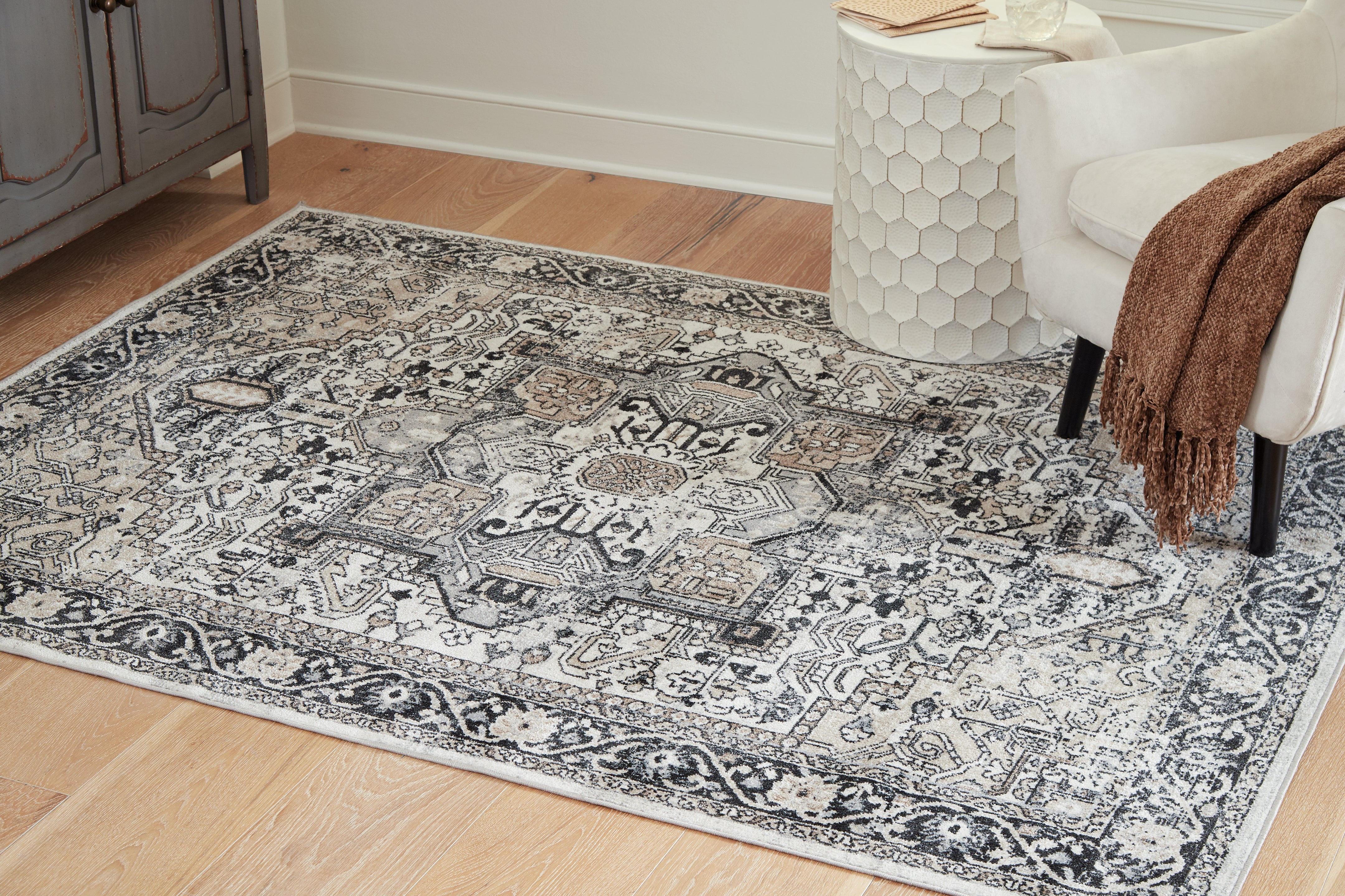 3 Brothers Decor - Ashley Furniture - Gregmoore Rug - 5'2" x 6'10" Washable Rug / Multi - R405822