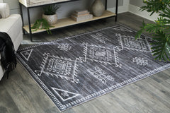 3 Brothers Decor - Ashley Furniture - Arloman Rug - 5' x 7' Washable Rug / Black/Cream/Gray - R405932