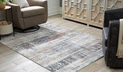 3 Brothers Decor - Ashley Furniture - Rhettner Rug - 5'3" x 7'3" Rug / Multi - R406072