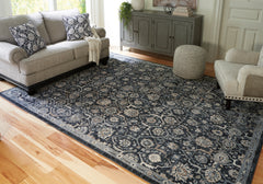 3 Brothers Decor - Ashley Furniture - Hilcott Rug - 7'10" x 10'6" Rug / Blue/Cream/Brown - R406111