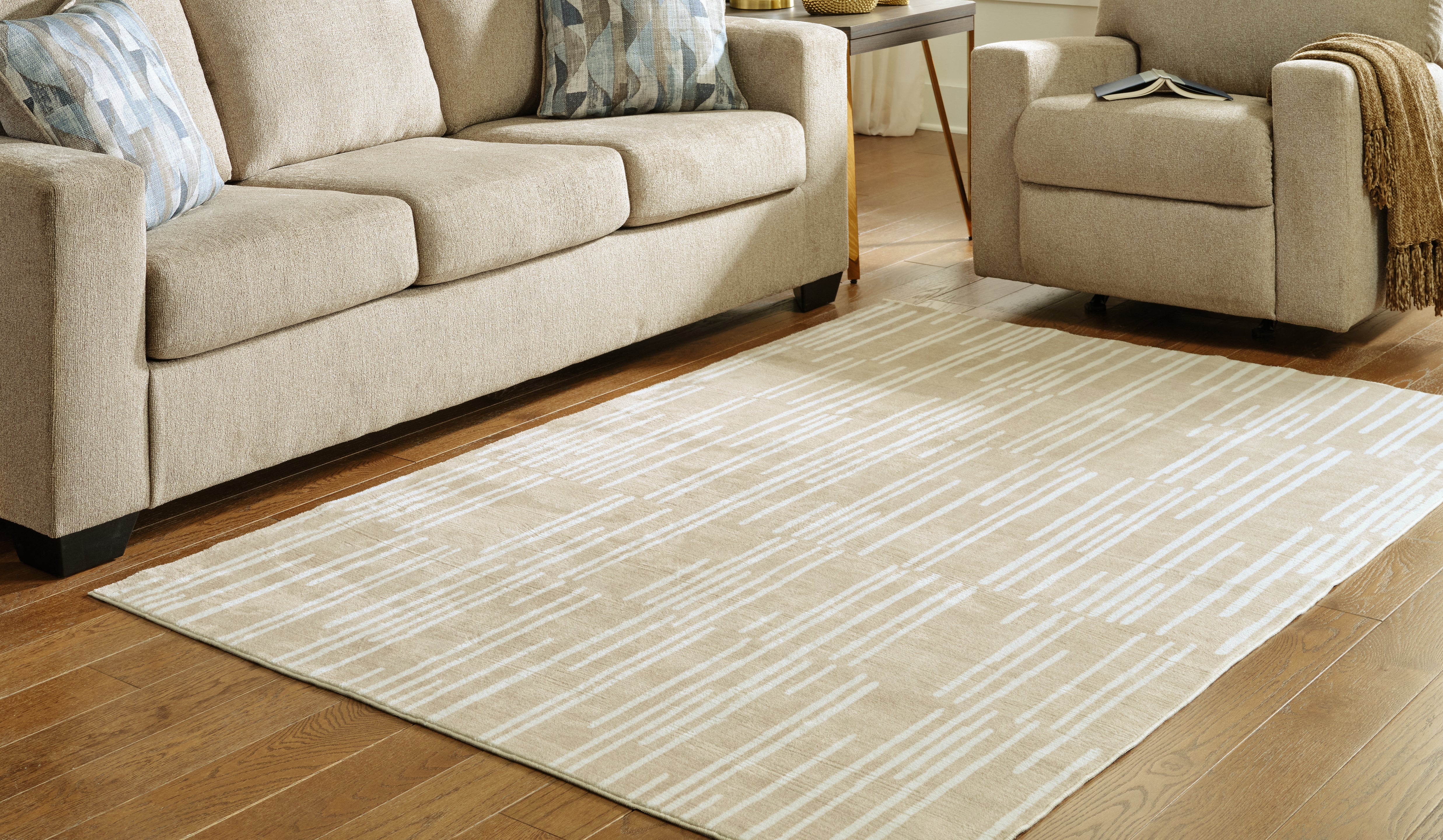 3 Brothers Decor - Ashley Furniture - Ardenville Rug - 5' x 7'1" Washable Rug / Tan/Cream - R406212