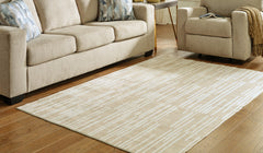 3 Brothers Decor - Ashley Furniture - Ardenville Rug - 5' x 7'1" Washable Rug / Tan/Cream - R406212