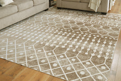3 Brothers Decor - Ashley Furniture - Bunchly Rug - 7'10" x 10'3" Washable Rug / Tan/Brown/Cream - R406221