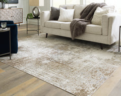3 Brothers Decor - Ashley Furniture - Grifflain Rug - 7'10" x 10'3" Washable Rug / Tan/Brown/Gray - R406231