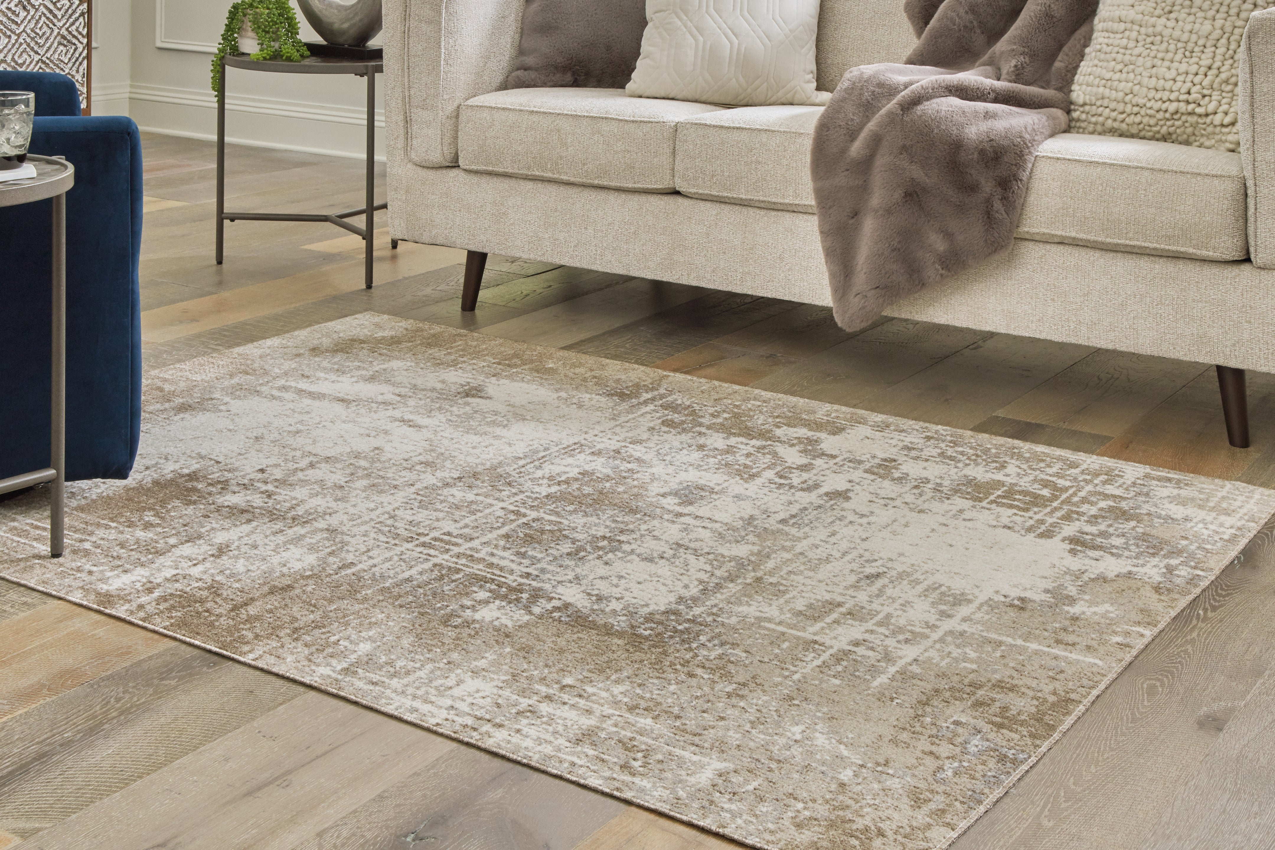 3 Brothers Decor - Ashley Furniture - Grifflain Rug - 5'1" x 7' Washable Rug / Tan/Brown/Gray - R406232