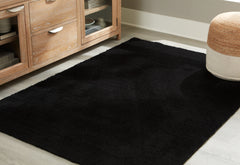 3 Brothers Decor - Ashley Furniture - Anaben Rug - 8' x 10'1" Washable Rug / Black - R406311
