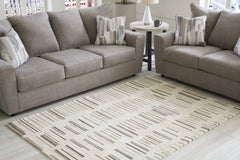 3 Brothers Decor - Ashley Furniture - Leesdale Rug - 5' x 7' Rug / Ivory/Brown/Black - R406422