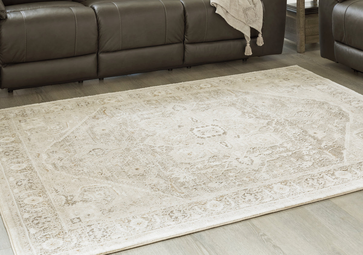 3 Brothers Decor - Ashley Furniture - Gatwell Rug - 5' x 7' Rug / Ivory/Gray/Tan - R406512