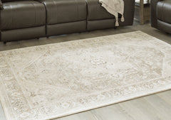 3 Brothers Decor - Ashley Furniture - Gatwell Rug - 5' x 7' Rug / Ivory/Gray/Tan - R406512