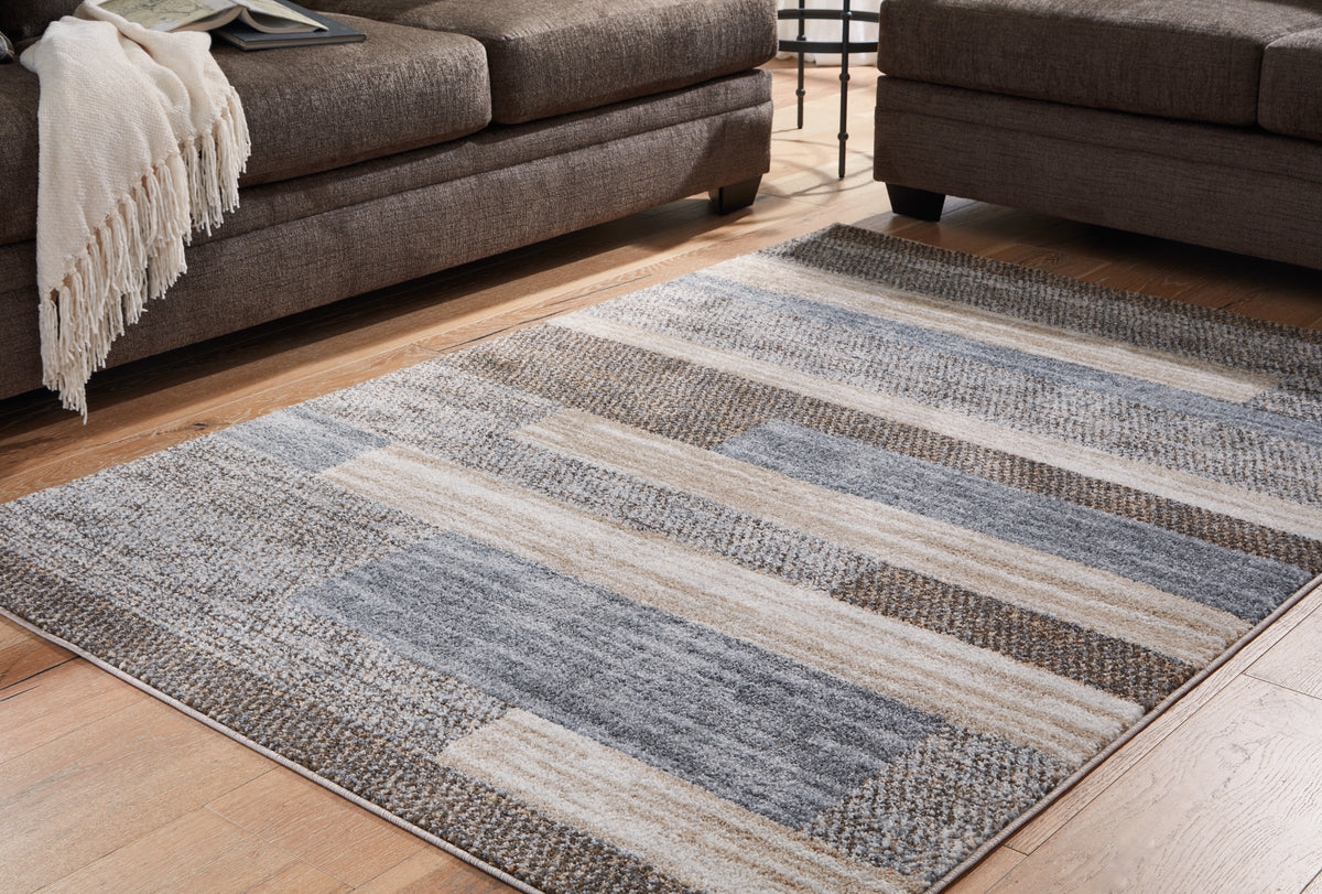 3 Brothers Decor - Ashley Furniture - Sethburn Rug - 8' x 10' Rug / Cream/Brown/Gray - R406591