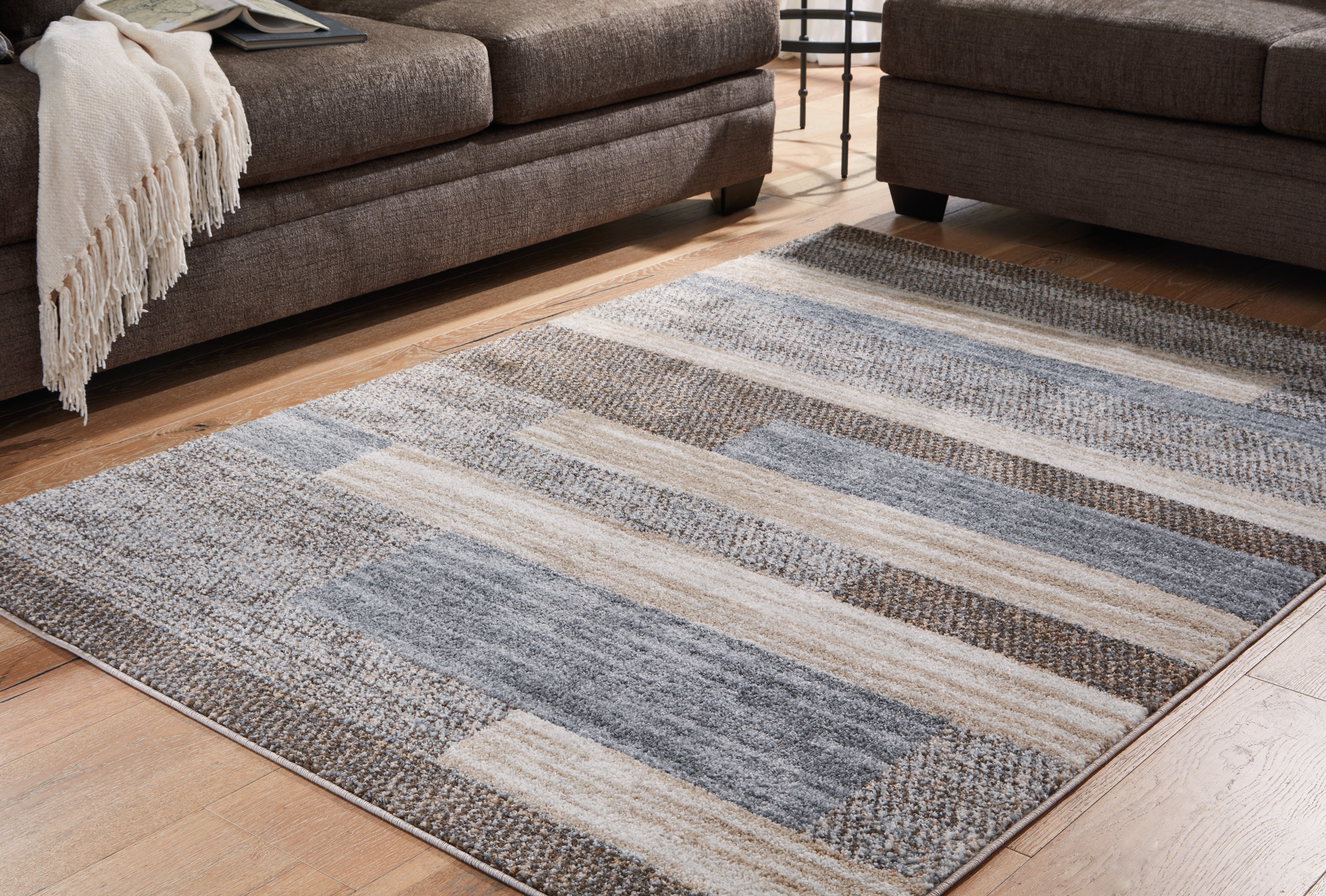 3 Brothers Decor - Ashley Furniture - Sethburn Rug - 5' x 7' Rug / Cream/Brown/Gray - R406592