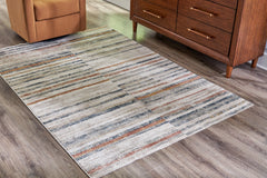 3 Brothers Decor - Ashley Furniture - Kemart Rug - 5' x 7' Rug / Multi - R406682