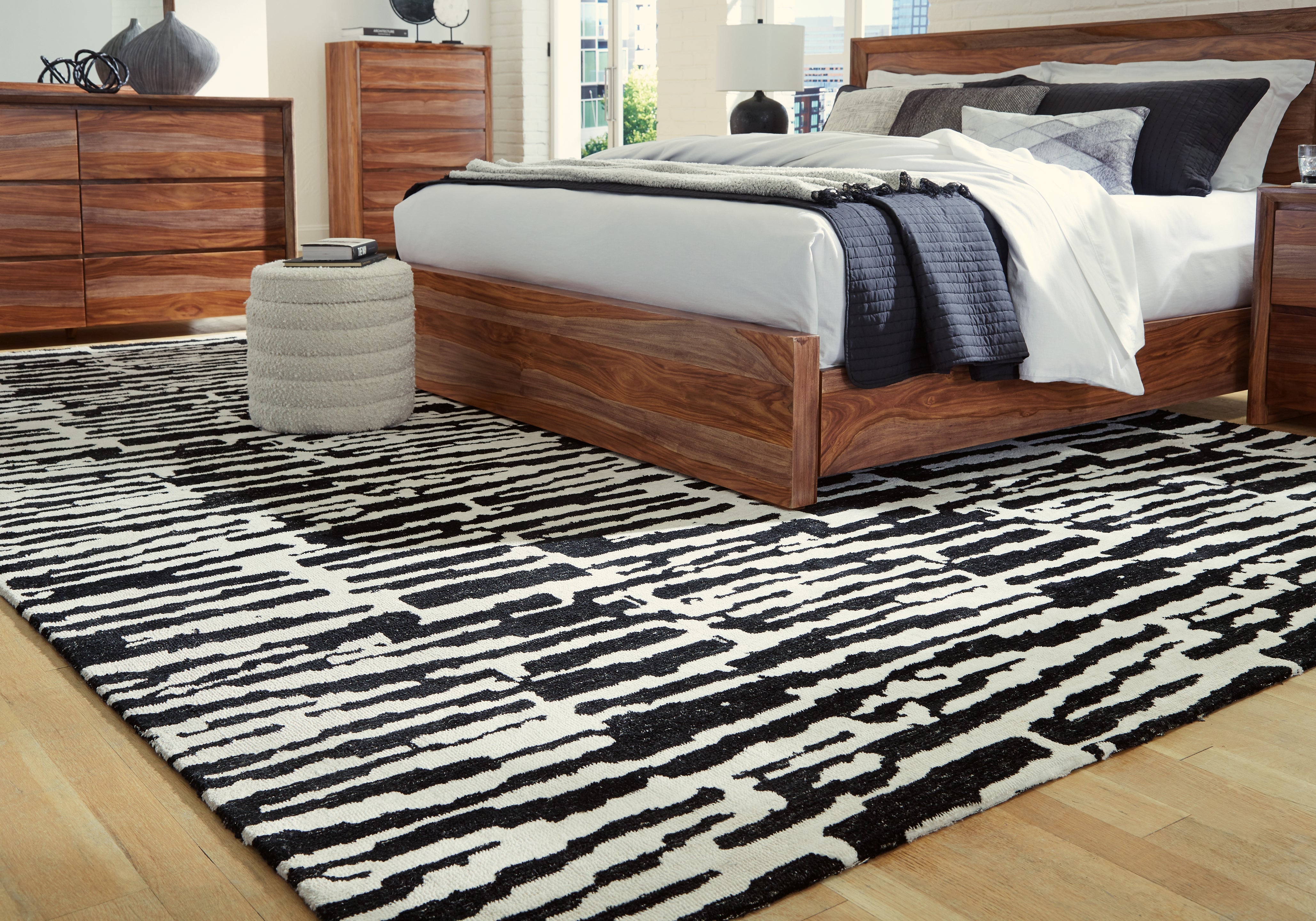 3 Brothers Decor - Ashley Furniture - Bramshaw Rug - 10' x 14' Rug / Black/Ivory - R406760