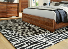 3 Brothers Decor - Ashley Furniture - Bramshaw Rug - 8' x 10' Rug / Black/Ivory - R406761