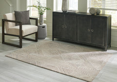 3 Brothers Decor - Ashley Furniture - Jadott Rug - 5' x 7' Rug / Beige/Brown - R406802