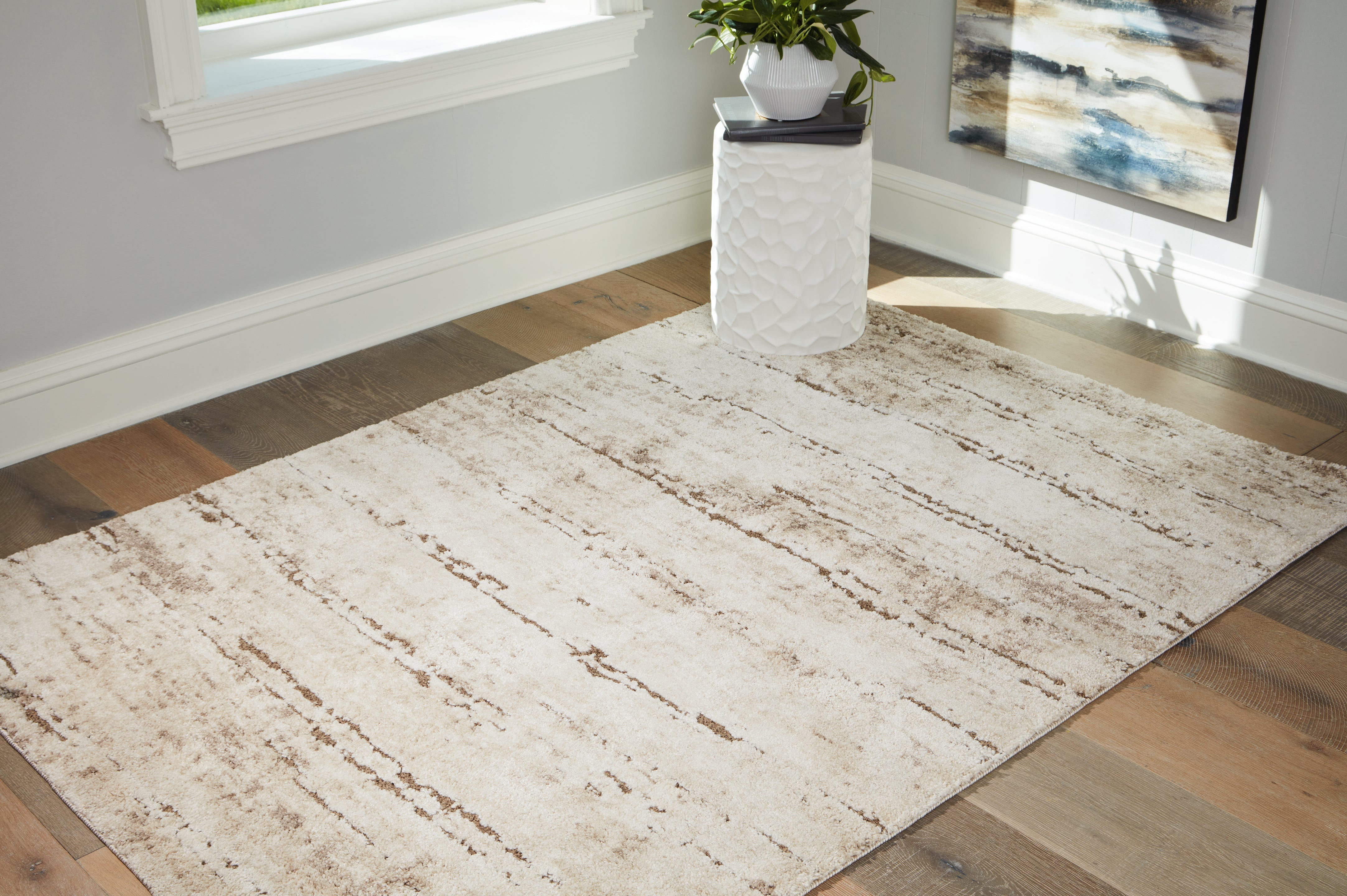3 Brothers Decor - Ashley Furniture - Kasney Rug - 8' x 10' Rug / Cream/Brown - R406851