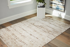 3 Brothers Decor - Ashley Furniture - Kasney Rug - 8' x 10' Rug / Cream/Brown - R406851