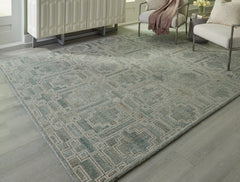 3 Brothers Decor - Ashley Furniture - Jossland Rug - 8' x 10' Rug / Green/Ivory - R406911