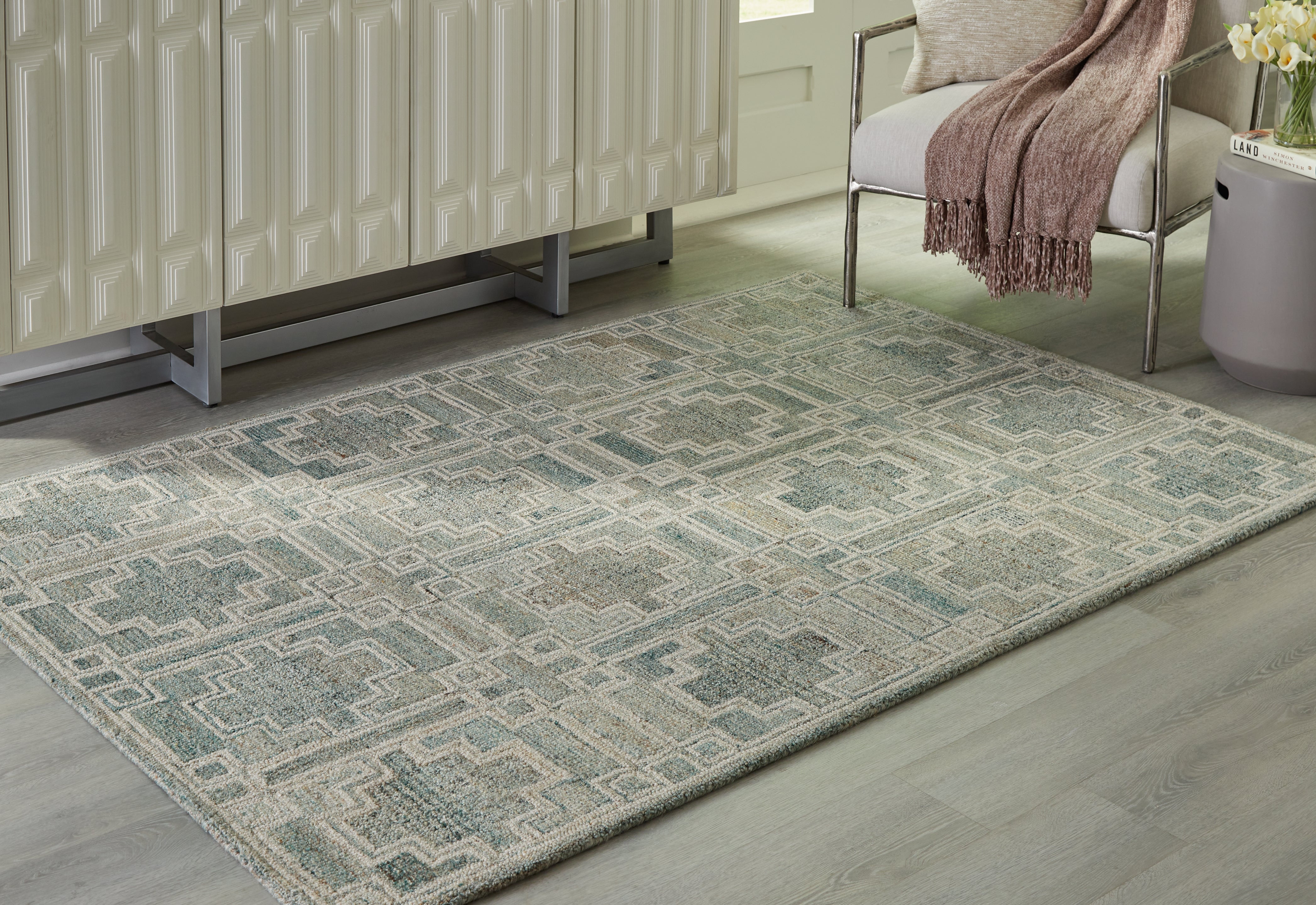 3 Brothers Decor - Ashley Furniture - Jossland Rug - 5' x 7' Rug / Green/Ivory - R406912