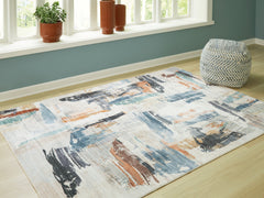 3 Brothers Decor - Ashley Furniture - Hessland Rug - 5' x 7' Washable Rug / Multi - R407052