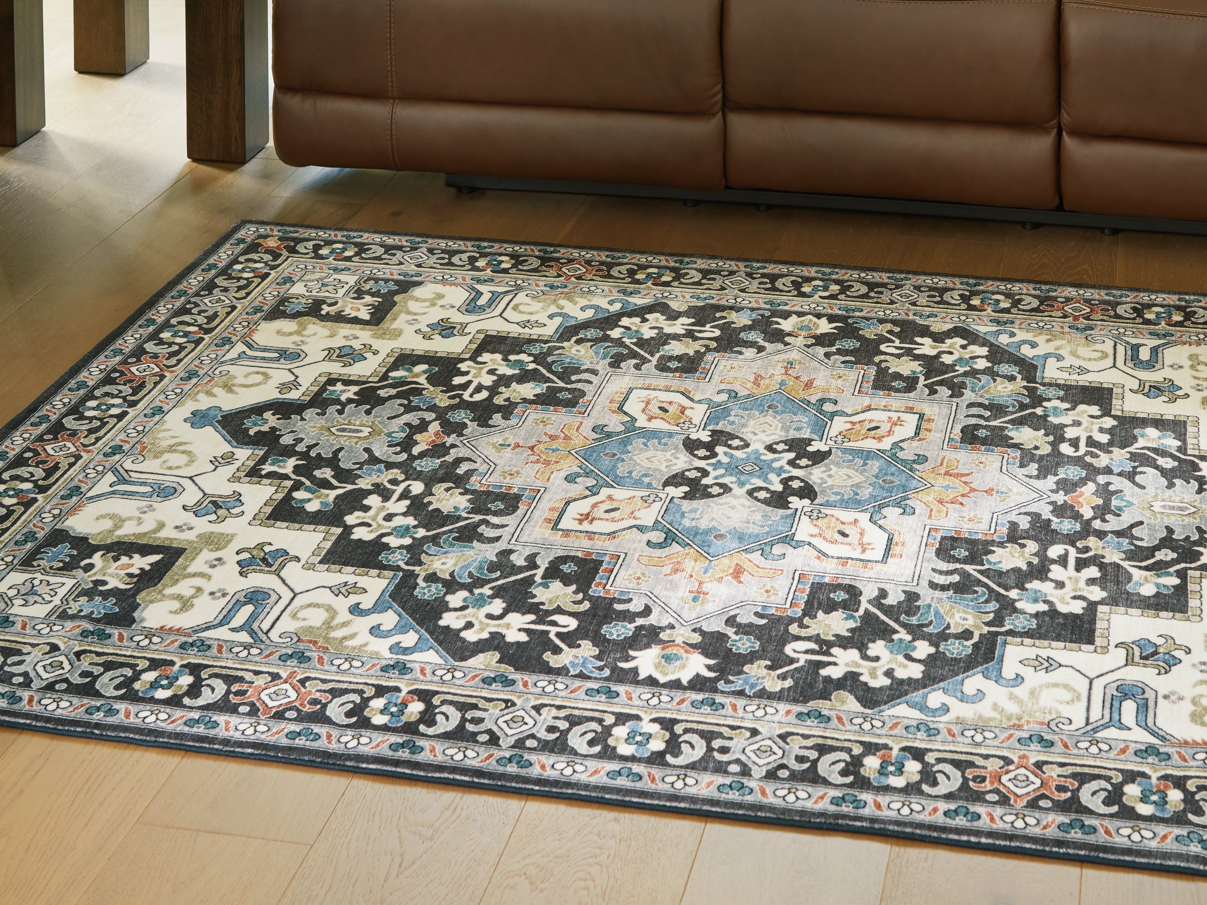 3 Brothers Decor - Ashley Furniture - Leningston Rug - 8' x 10' Washable Rug / Black/Cream/Blue - R407061