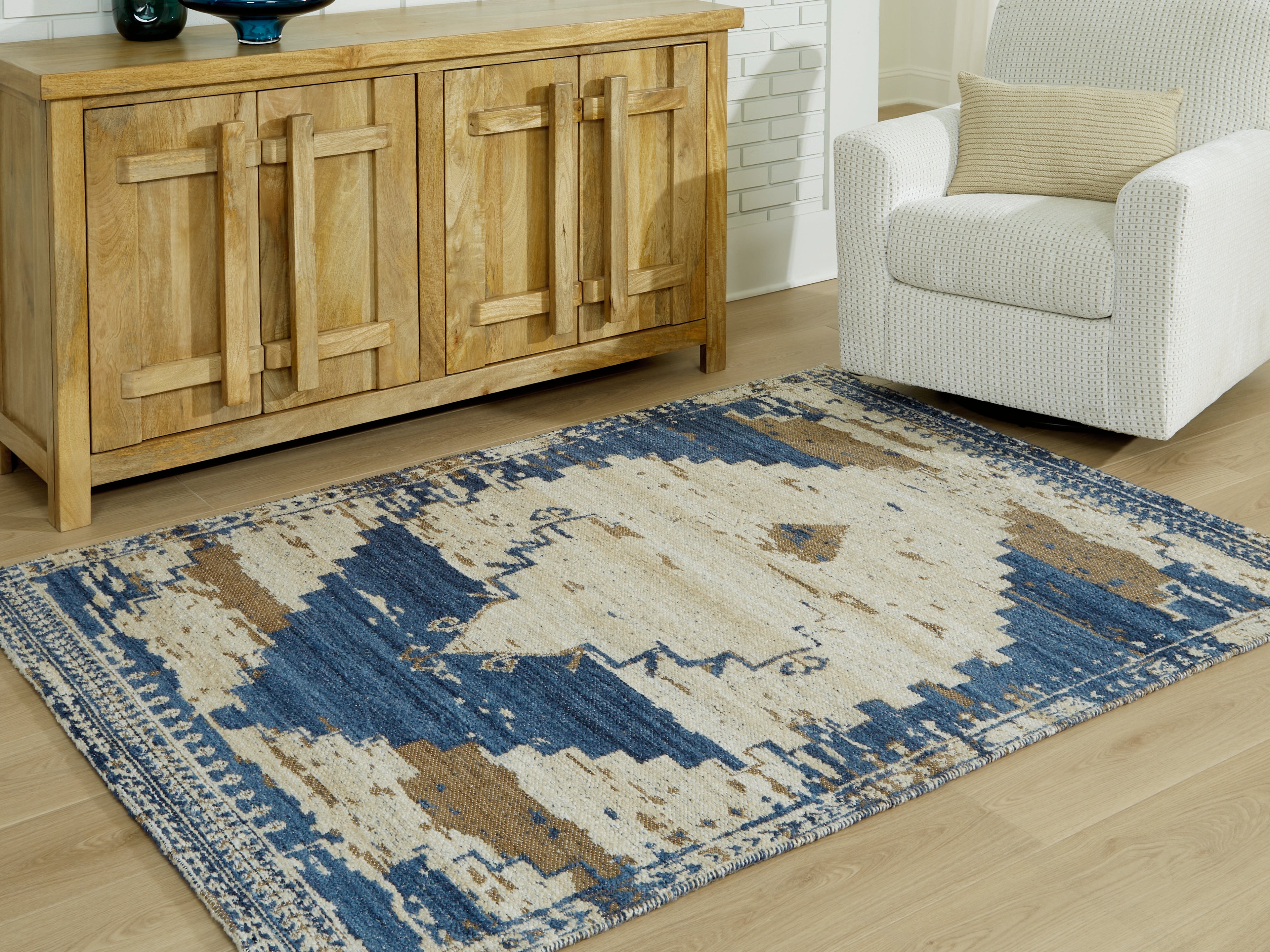 3 Brothers Decor - Ashley Furniture - Varnler Rug - 5' x 7' Rug / Blue/Brown/Tan - R407132