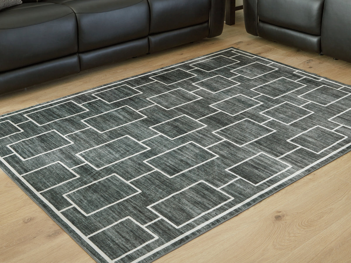 3 Brothers Decor - Ashley Furniture - Elderland Rug - Washable 5' x 7' Area Rug / Black/Gray - R407402