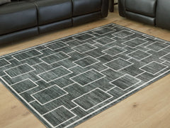 3 Brothers Decor - Ashley Furniture - Elderland Rug - Washable 5' x 7' Area Rug / Black/Gray - R407402