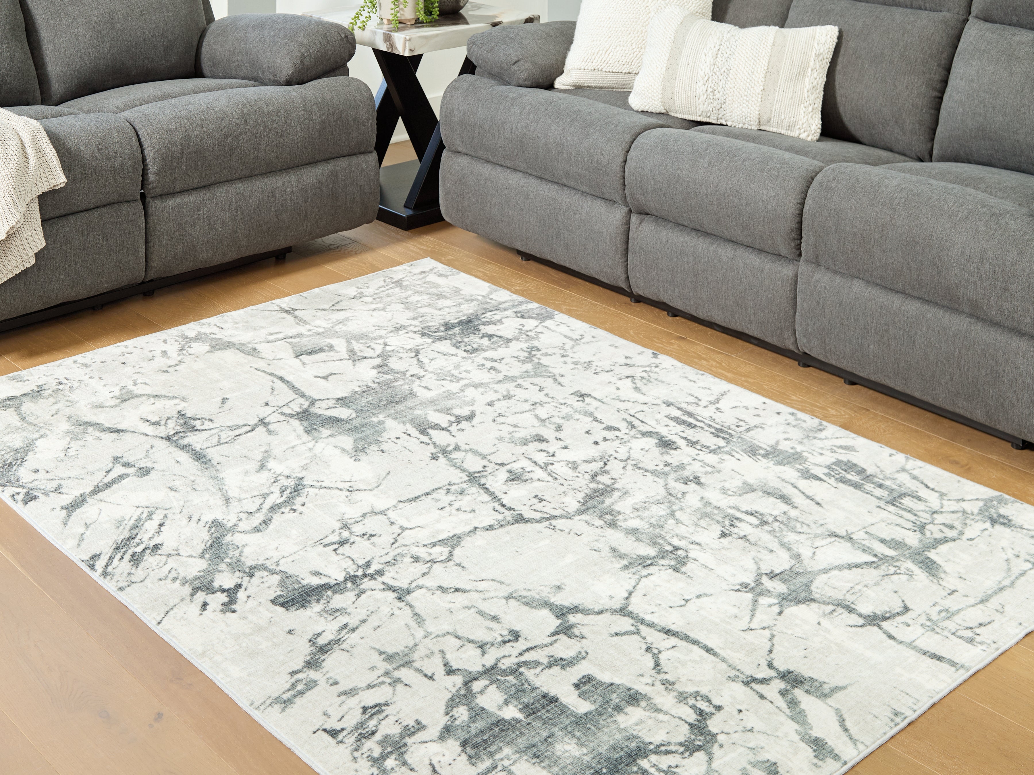 3 Brothers Decor - Ashley Furniture - Tobinbury Rug - Washable 5' x 7' Area Rug / Gray - R407422