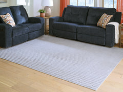 3 Brothers Decor - Ashley Furniture - Worthley Rug - Washable 8' x 10' Area Rug / Gray - R407451
