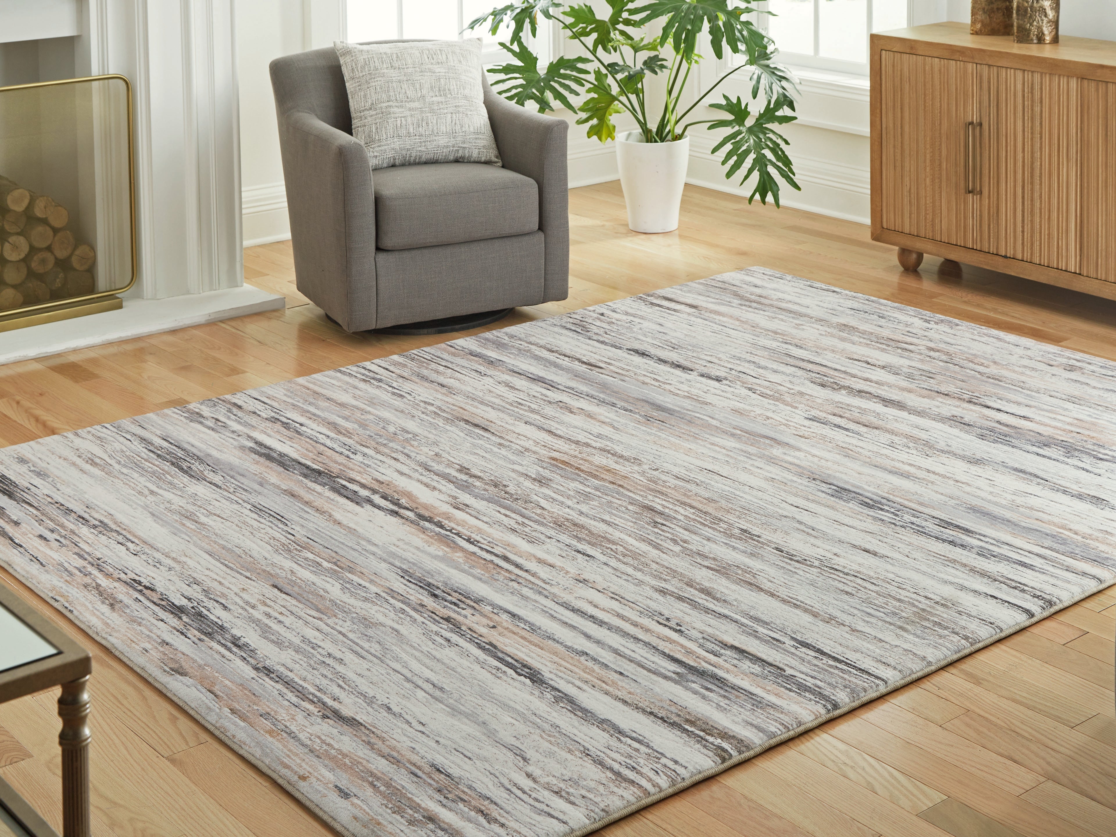 3 Brothers Decor - Ashley Furniture - Nace Rug - 7'6" x 9'6" Area Rug / Gray/Brown/White - R407471