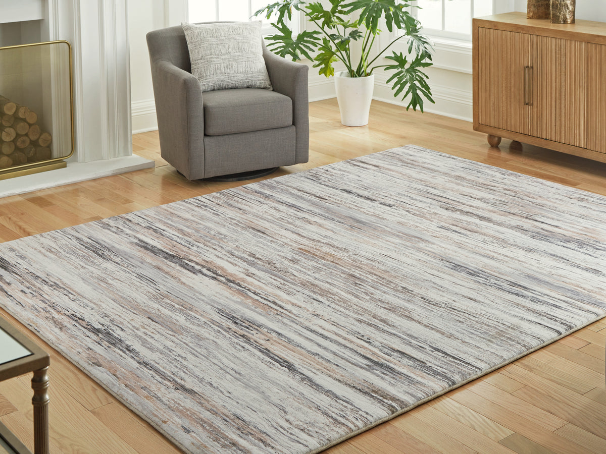 3 Brothers Decor - Ashley Furniture - Nace Rug - 7'6" X 9'6" Memory Foam Area Rug - R407471