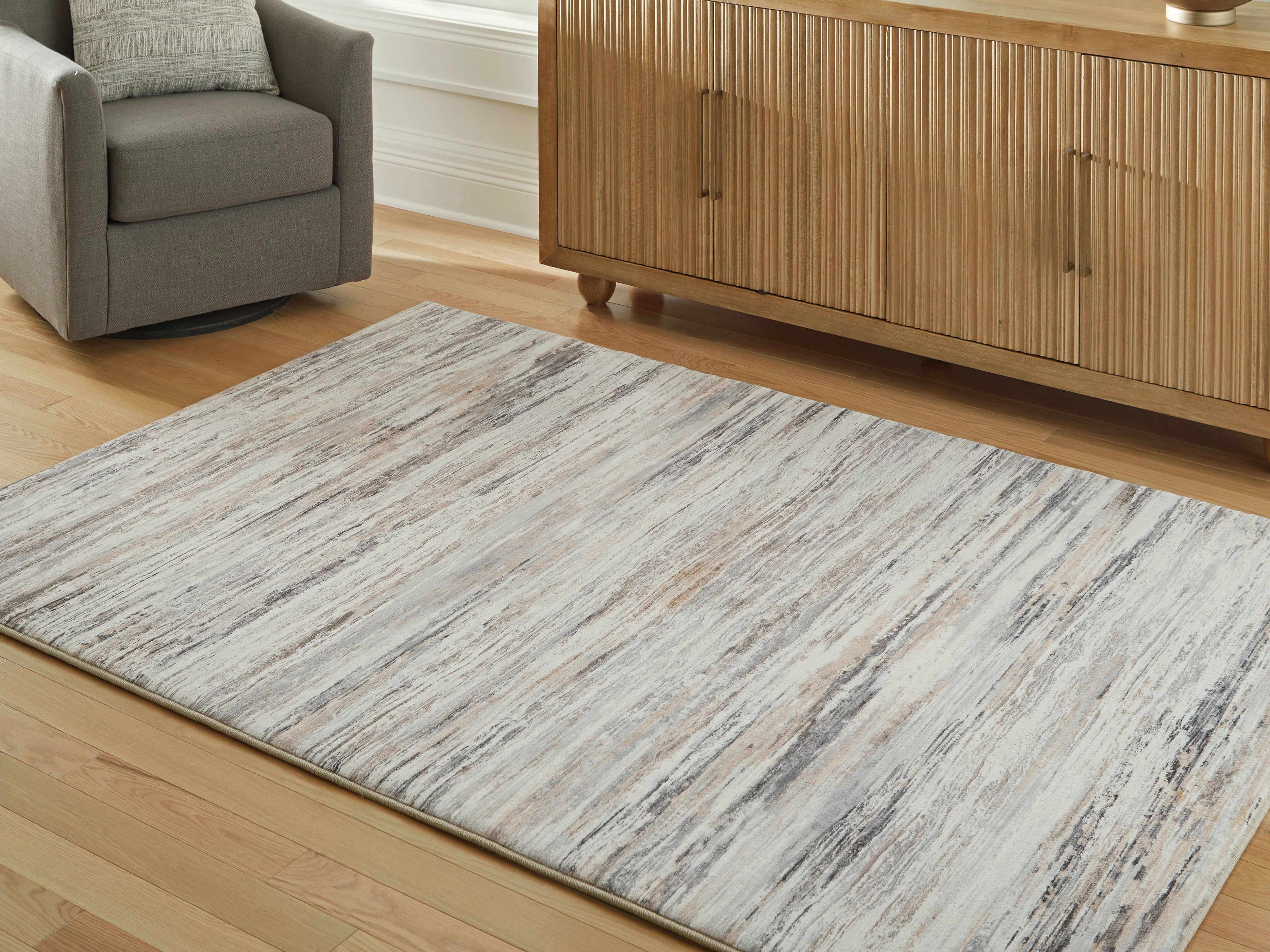 3 Brothers Decor - Ashley Furniture - Nace Rug - 5' x 7' Area Rug / Gray/Brown/White - R407472