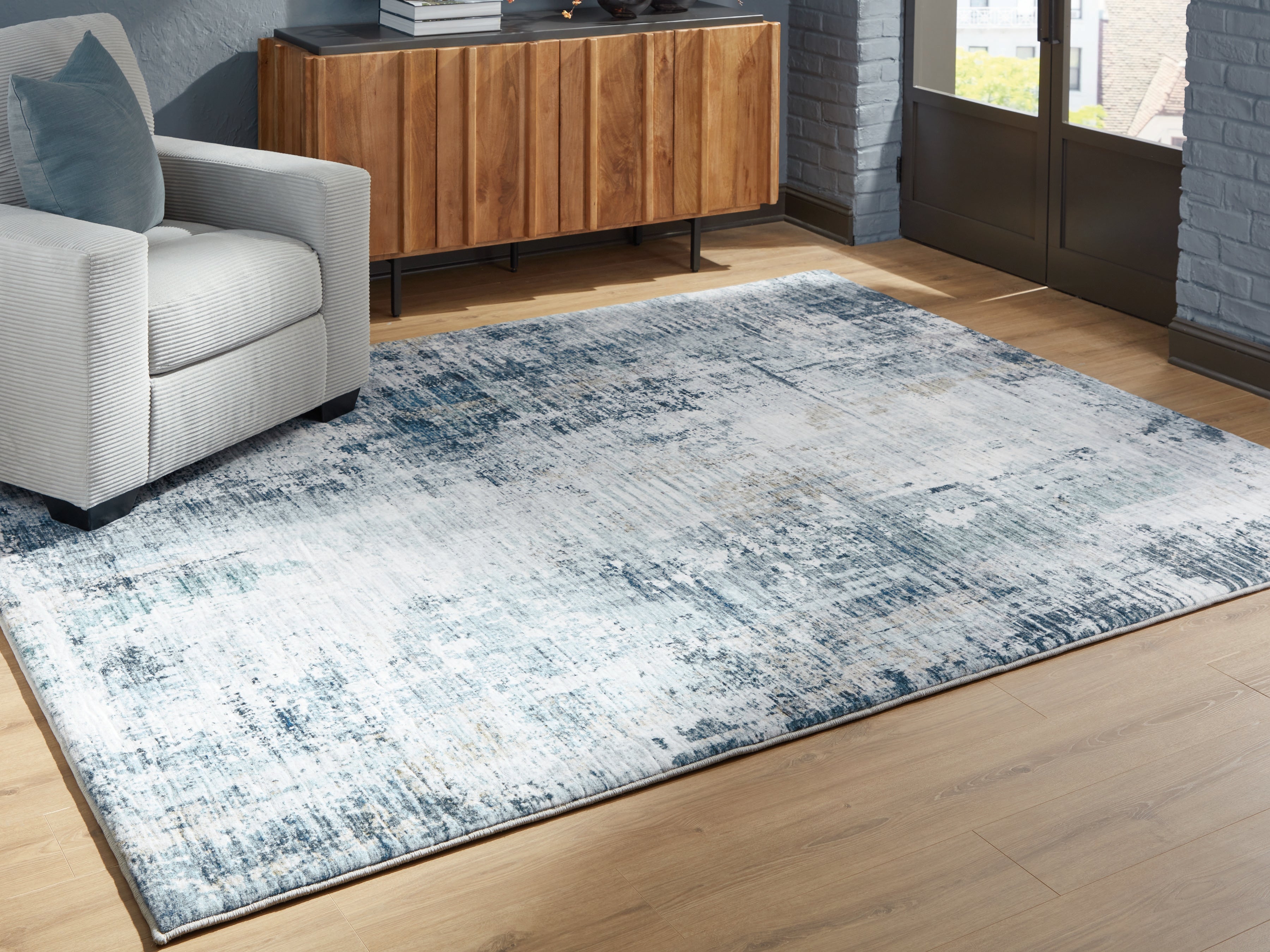 3 Brothers Decor - Ashley Furniture - Arlenmont Rug - 7'6" x 9'6" Area Rug / Blue/White/Brown - R407481