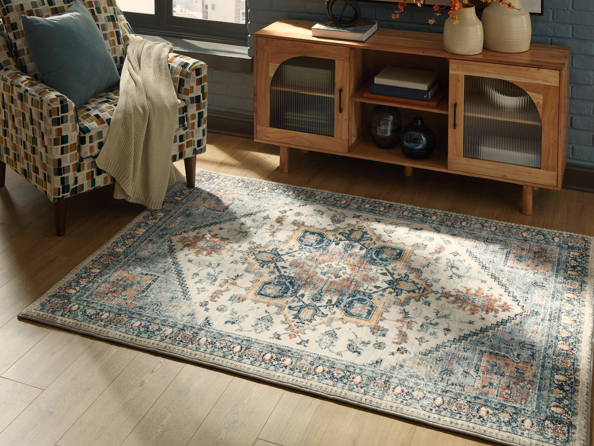 3 Brothers Decor - Ashley Furniture - Wallney Rug - 5' x 7' Area Rug / Multi - R407492