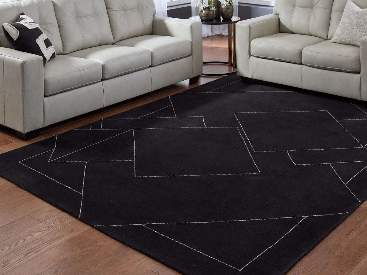 3 Brothers Decor - Ashley Furniture - Marav Rug - 7'8" x 10' Area Rug / Black/White - R407531