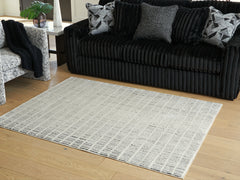 3 Brothers Decor - Ashley Furniture - Turinwith Rug - 5'3" x 7' Area Rug / Ivory/Black - R407552