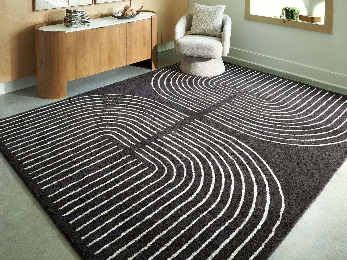 3 Brothers Decor - Ashley Furniture - Eldonmore Rug - 7'8" x 10' Area Rug / Black/Ivory - R407571