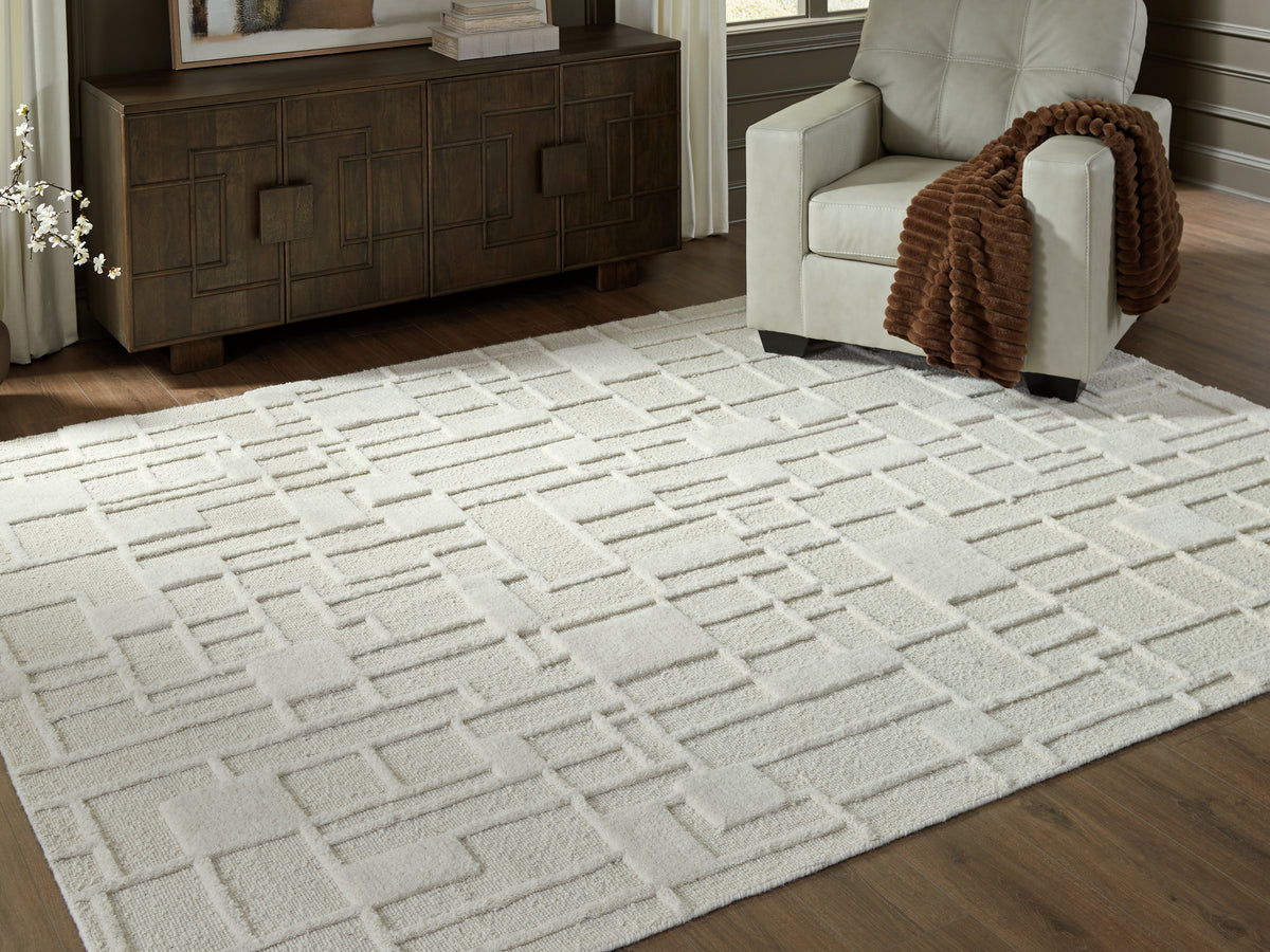 3 Brothers Decor - Ashley Furniture - Empriss Rug - 7'8" x 10' Area Rug / Ivory - R407621