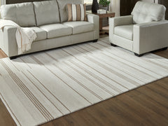 3 Brothers Decor - Ashley Furniture - Gadence Rug - 7'8" x 10' Area Rug / Ivory/Tan - R407641