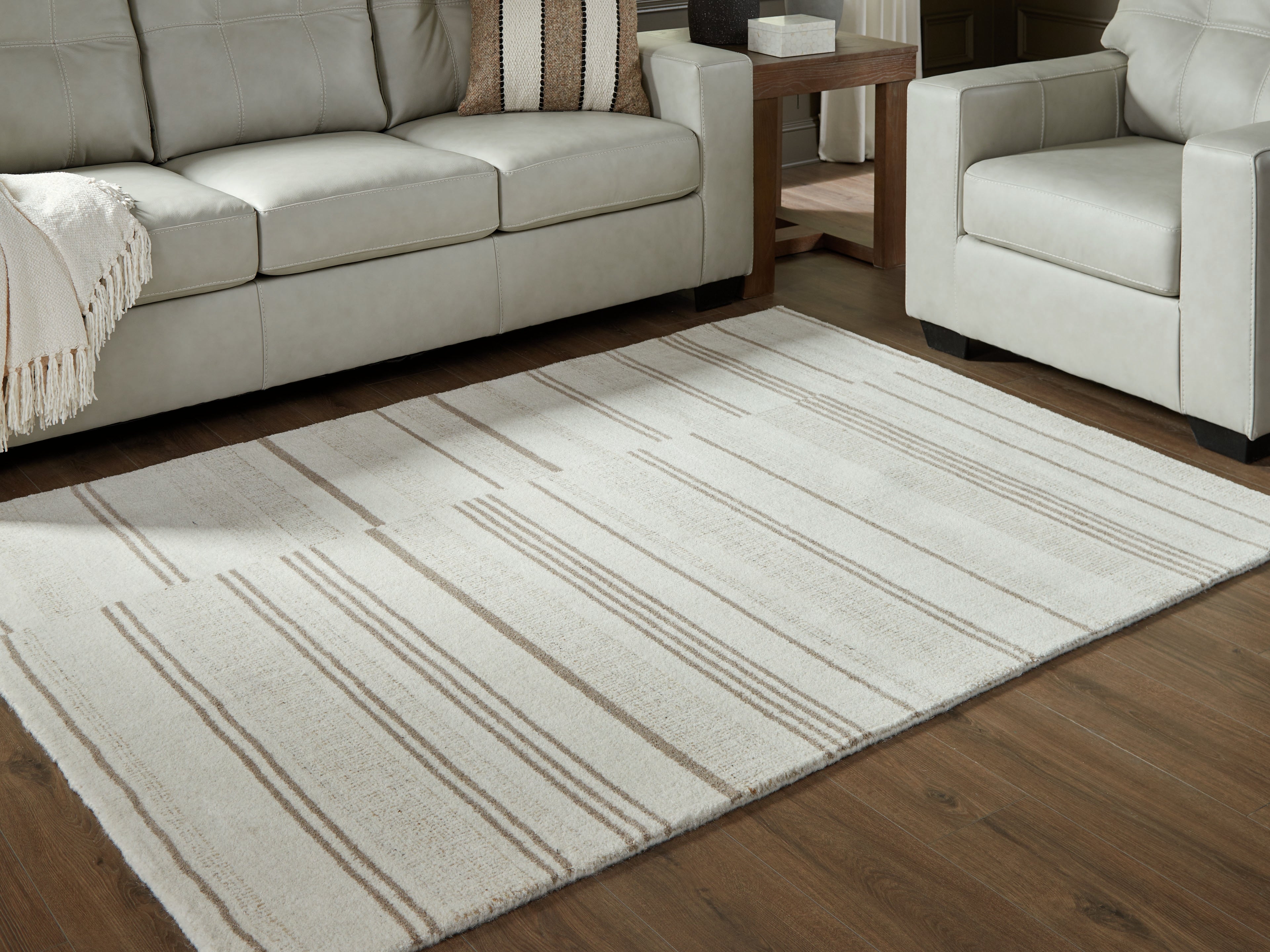 3 Brothers Decor - Ashley Furniture - Gadence Rug - 5' x 7' Area Rug / Ivory/Tan - R407642