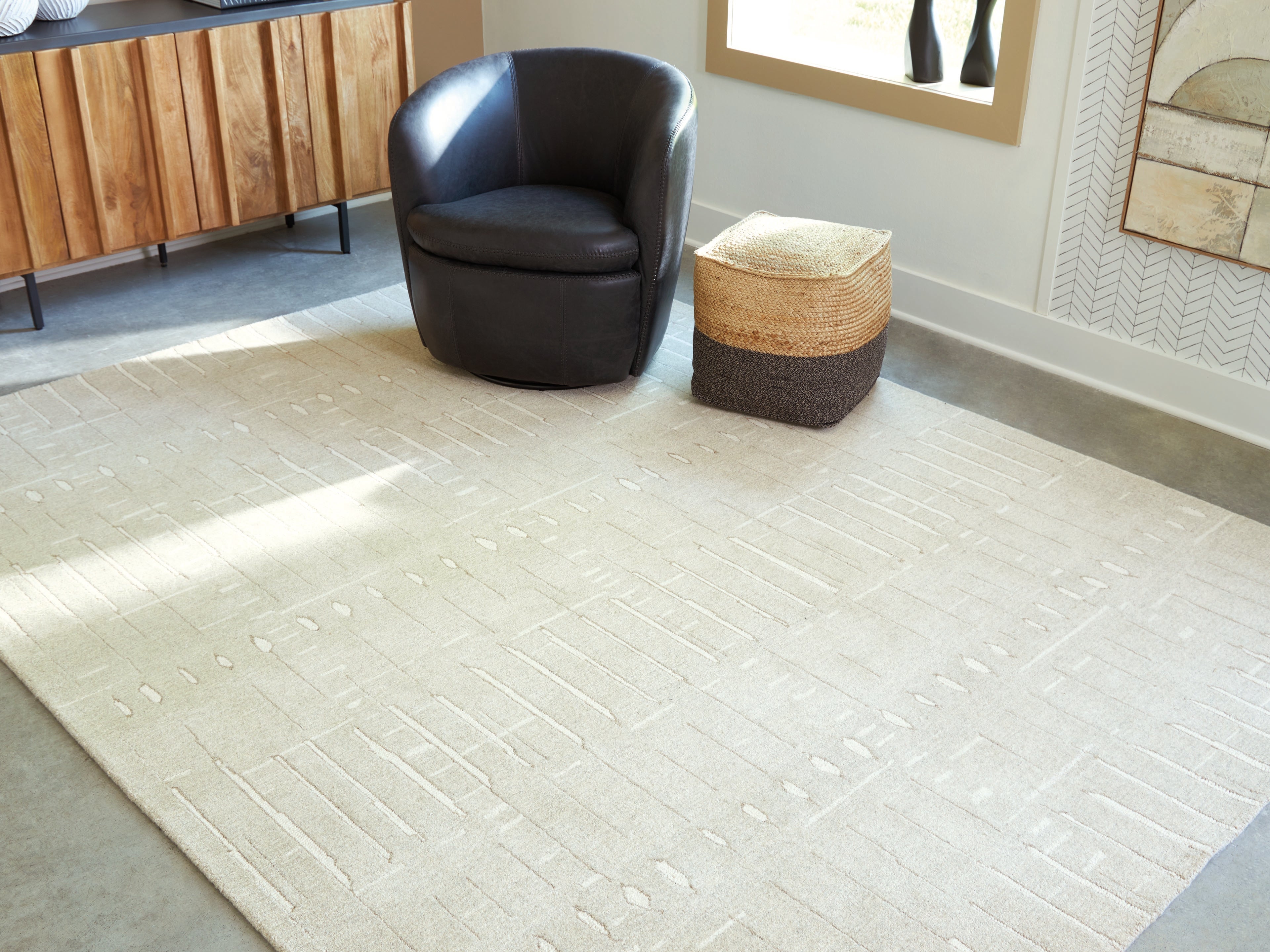 3 Brothers Decor - Ashley Furniture - Wolbert Rug - 7'8" x 10' Area Rug / Tan/Ivory - R407661