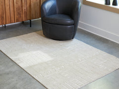 3 Brothers Decor - Ashley Furniture - Wolbert Rug - 5' x 7' Area Rug / Tan/Ivory - R407662