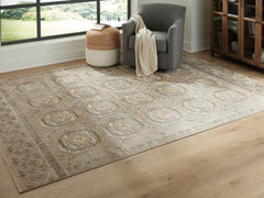 3 Brothers Decor - Ashley Furniture - Bachby Rug - 7'10" x 10' Area Rug / Multi - R407681
