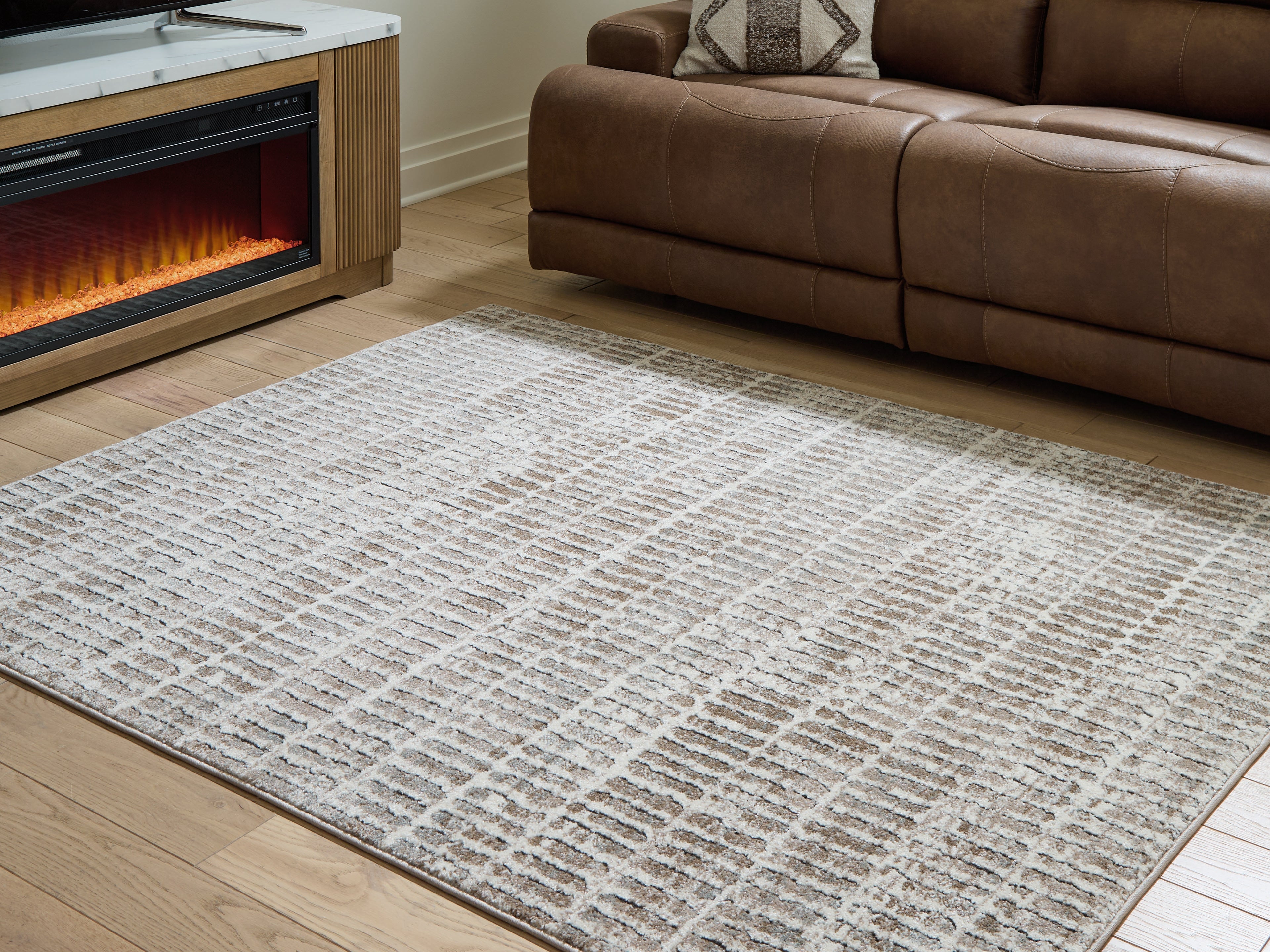 3 Brothers Decor - Ashley Furniture - Fuadwick Rug - 5'3" x 7' Area Rug / Multi - R407692