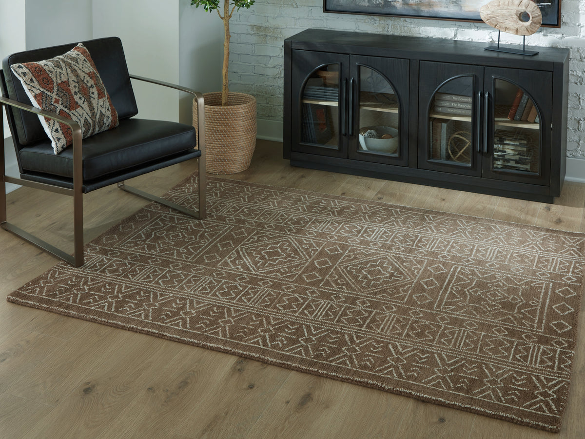 3 Brothers Decor - Ashley Furniture - Merrittman Rug - 5' x 7' Area Rug / Brown/Ivory - R407702